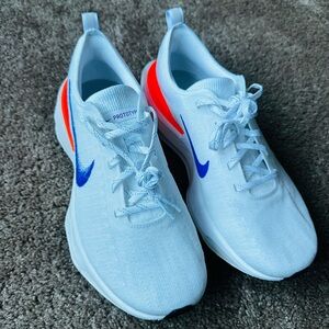 Nike Prototype Sneakers with Blue and Orange Accents